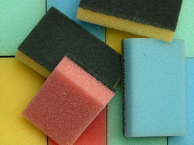 four assorted-color dishwashing sponges