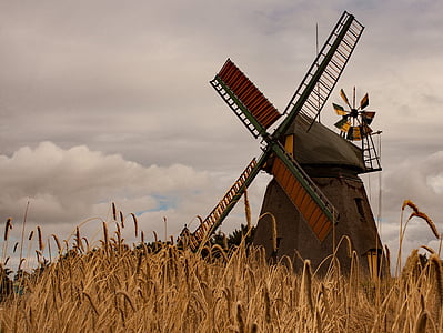 brown and black wooden windmill