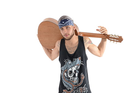 man wearing black tank top while carrying brown classical guitar