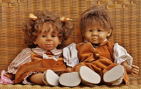 two boy and girl doll