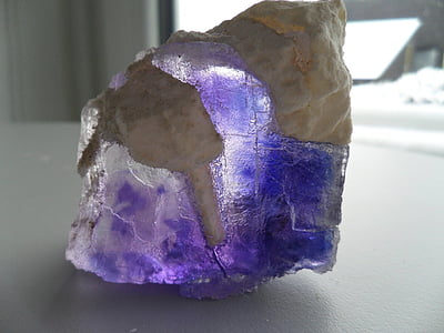 purple and beige geode on white surface