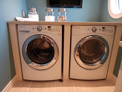 two white front-load washer and dryer set'