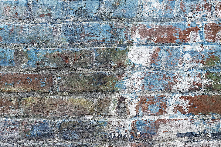 blue, white, and brown concrete wall