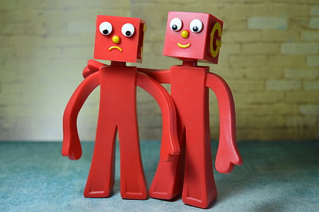 photo of two red action figures