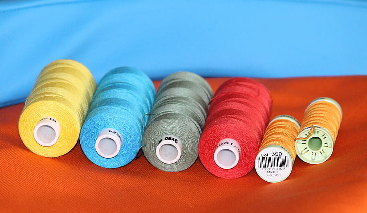 six assorted-color threads