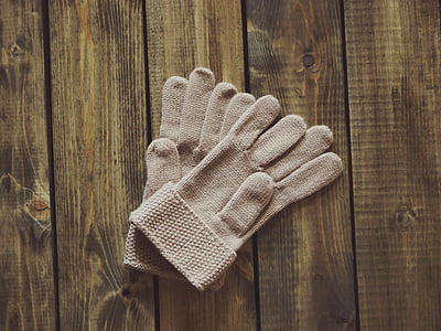 pair of brown knitted gloves