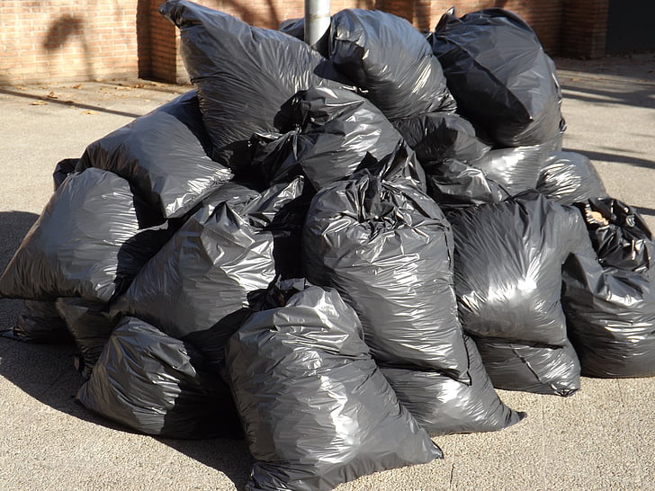 pile of black plastic bag lot