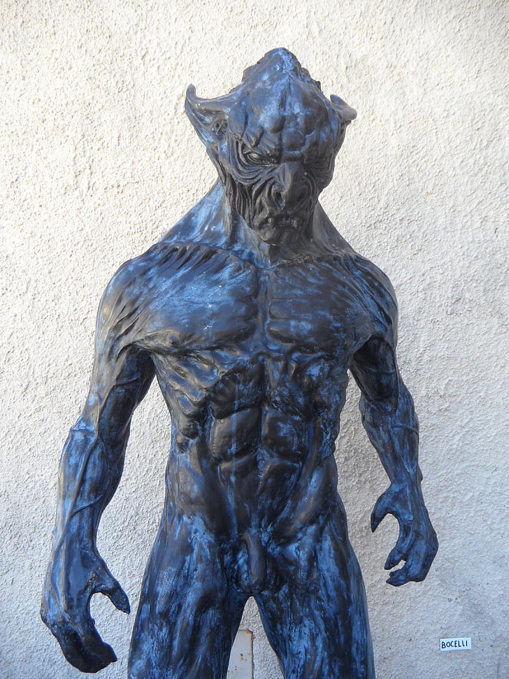 art photography of creature statue