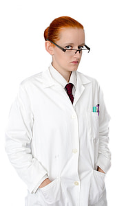 woman wearing white coat and eyeglasses