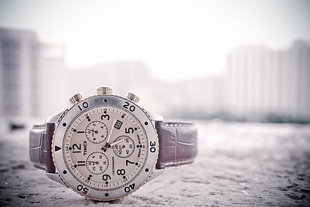 Timex chronograph watch on flooring