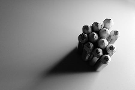 grayscale photography of stack of pencils