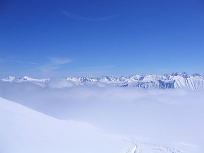 sea of clouds on snow mountain