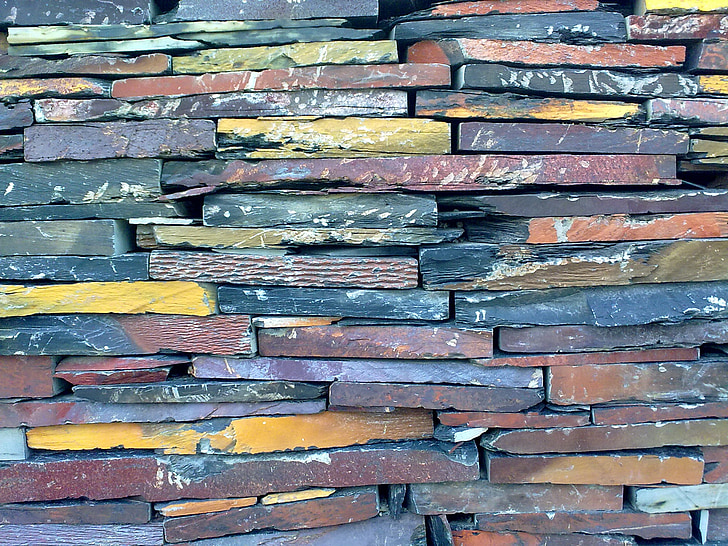 closeup photo of assorted-color of wall bricks