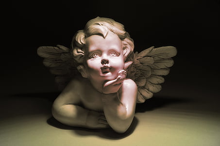 cherub with hands on cheek figurine]