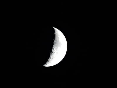 half moon during nighttime