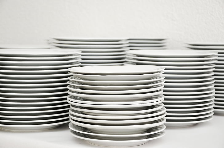 pile of white ceramic plates