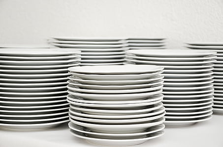 pile of white ceramic plates