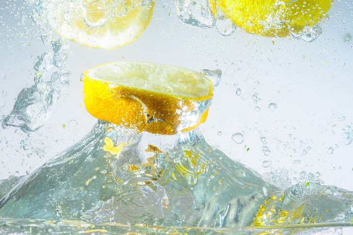 sliced lemon fruit on water