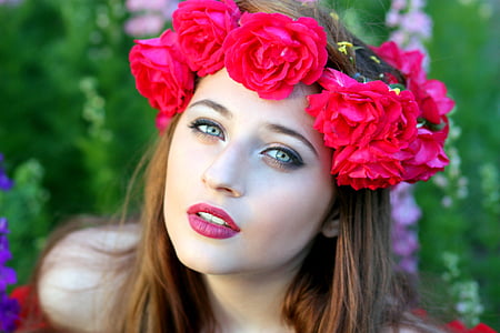 woman wearing red flower tiara