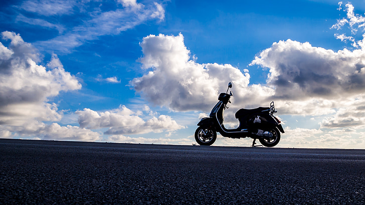 rule of thirds photography of black motorcycle