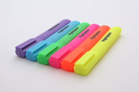 six assorted-color marking pens