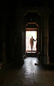 man standing in front of the door