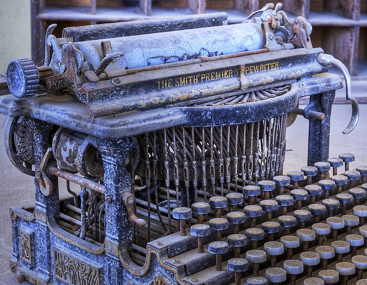 vintage blue and white typewriter