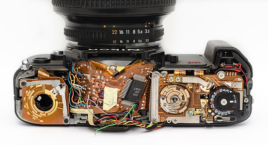 disassembled black SLR camera