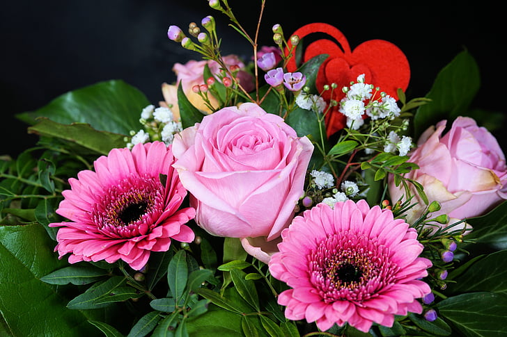 pink roses and gerbera daisy flowers