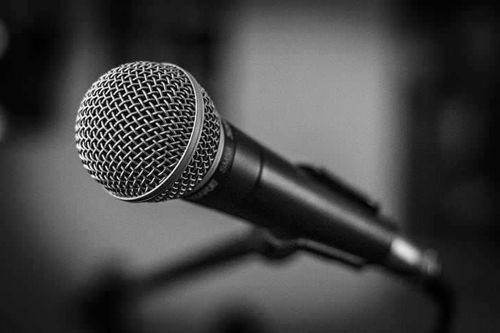 selective focus photography of black and grey microphone