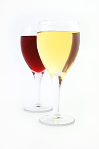 two clear drinking glasses filled with red and yellow liquids