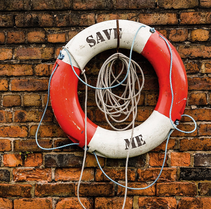 white and red Save Me-printed life buoy