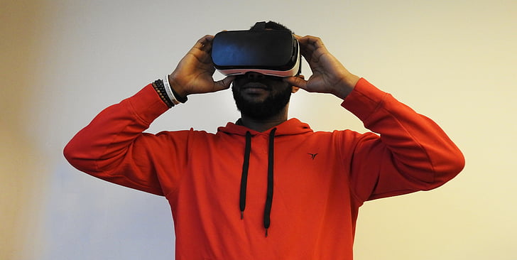 Royalty-Free photo: Man wearing VR goggles - PickPik