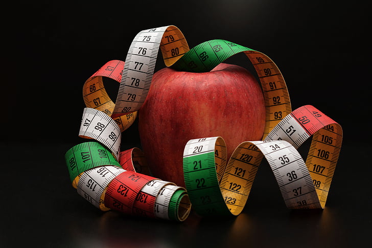 honeycrisp apple and tape measure