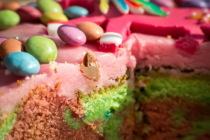 selective focus photo of rainbow cake