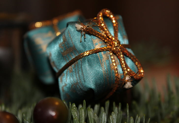 selective photography of green gift box