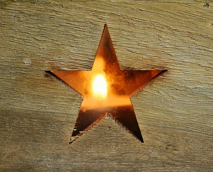 brown wooden plank with star figure