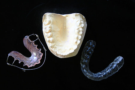 three assorted dentures