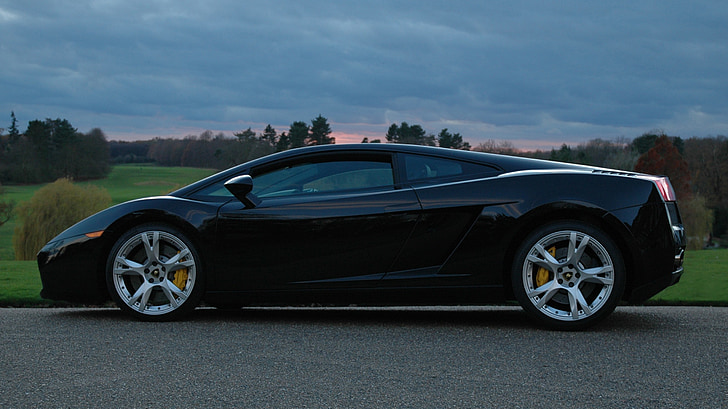 black Lamborghini Gallardo on road