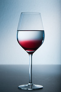 closeup photo of clear long-stem wine glass with beverage