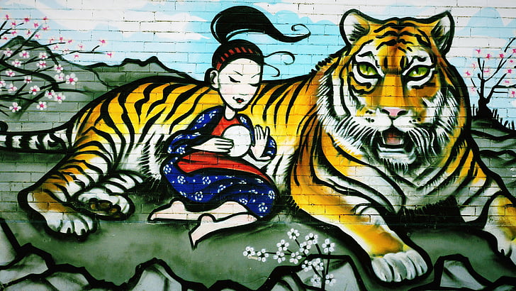 woman leaning on tiger painting