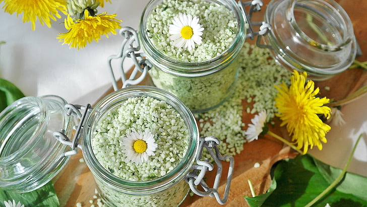 two glass jars filled with seeds