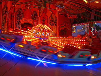 carnival ride with blue and red lights