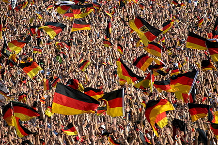 crowd holding Germany flags