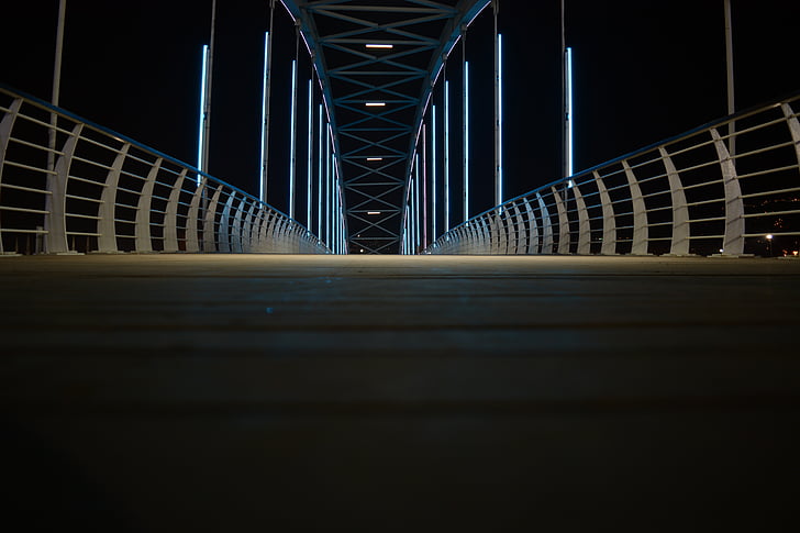 gray and white metal bridge during night time