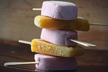 stack of pink and brown popsicles