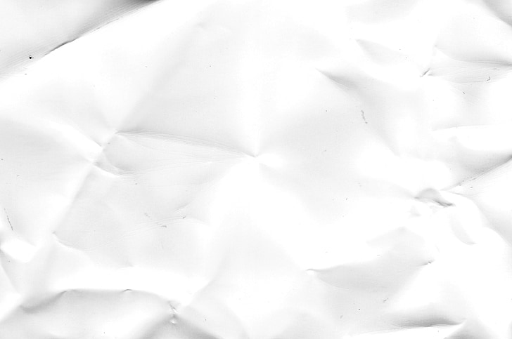 close-up photography of white crumpled paper