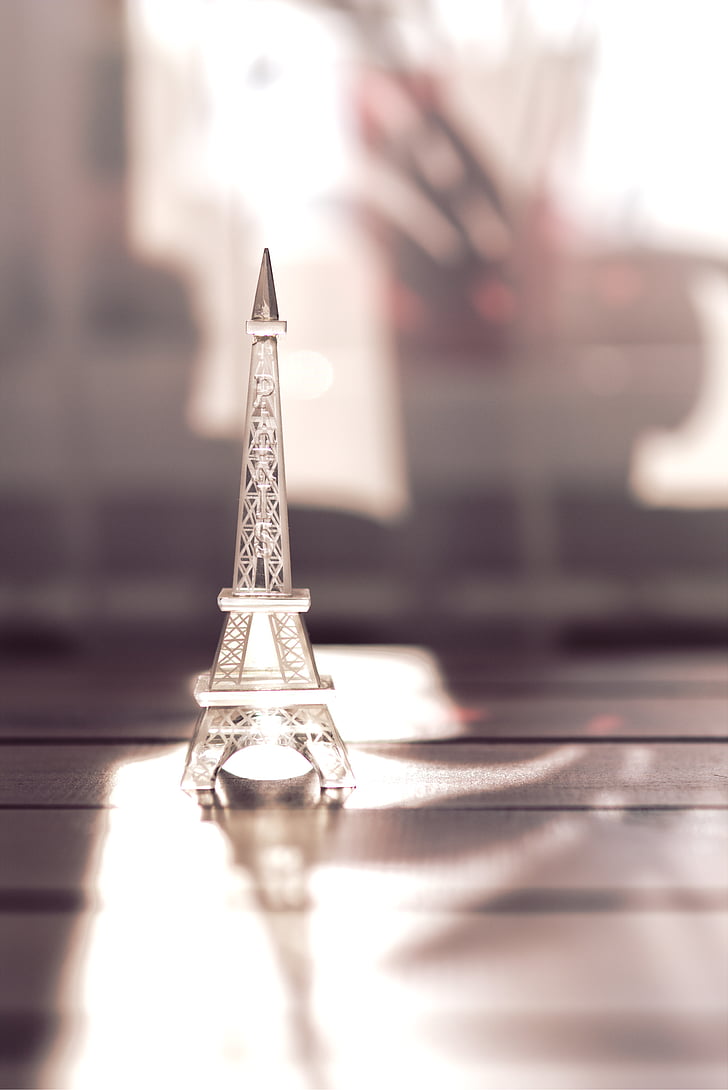 silver-colored Eiffel Tower model