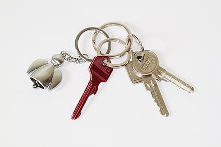 three gray and red keys