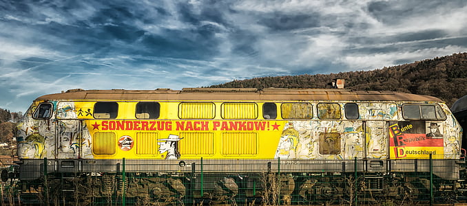 white and yellow train